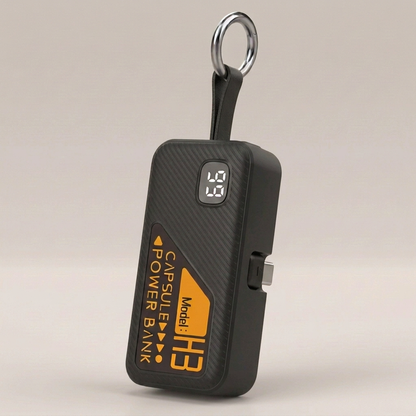 Black Key Capsule with folded USB-C connector and visible silver edge, black strap and silver keyring
