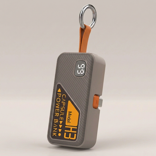 Gray Key Capsule with folded USB-C connector, orange strap and silver keyring